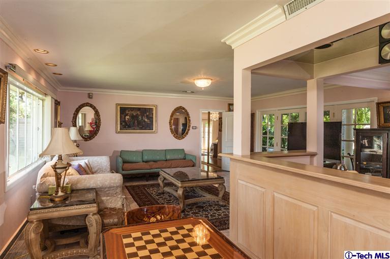 Undisclosed Address Pasadena, CA 91107 - Photo 5 of 16 a living room with furniture a rug and a large window