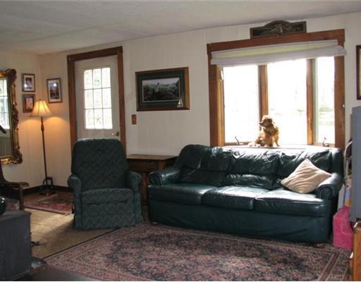 309 Howard Road Searsmont, ME 04973 - Photo 3 of 14 Living Room.