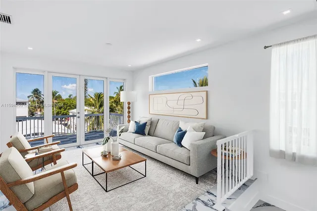 a view of a chairs and table in patio