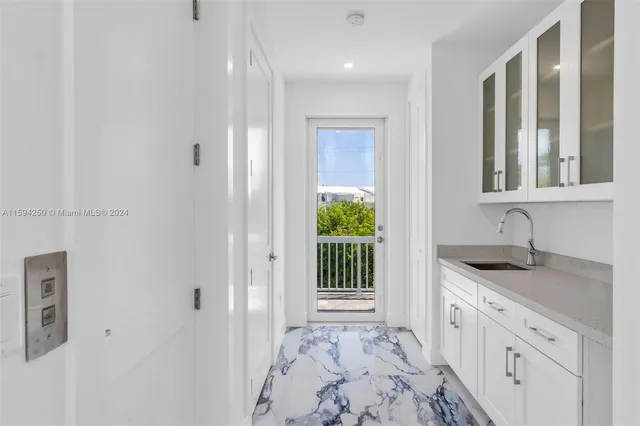 a view of balcony with furniture