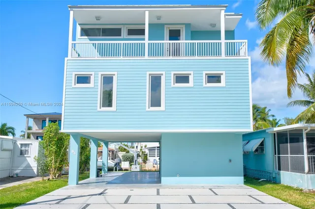 a view of a chairs and table on the terrace