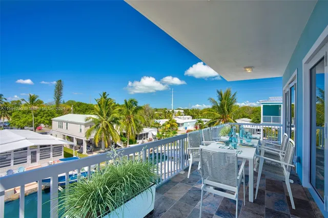 a kitchen with counter top space cabinets and stainless steel appliances