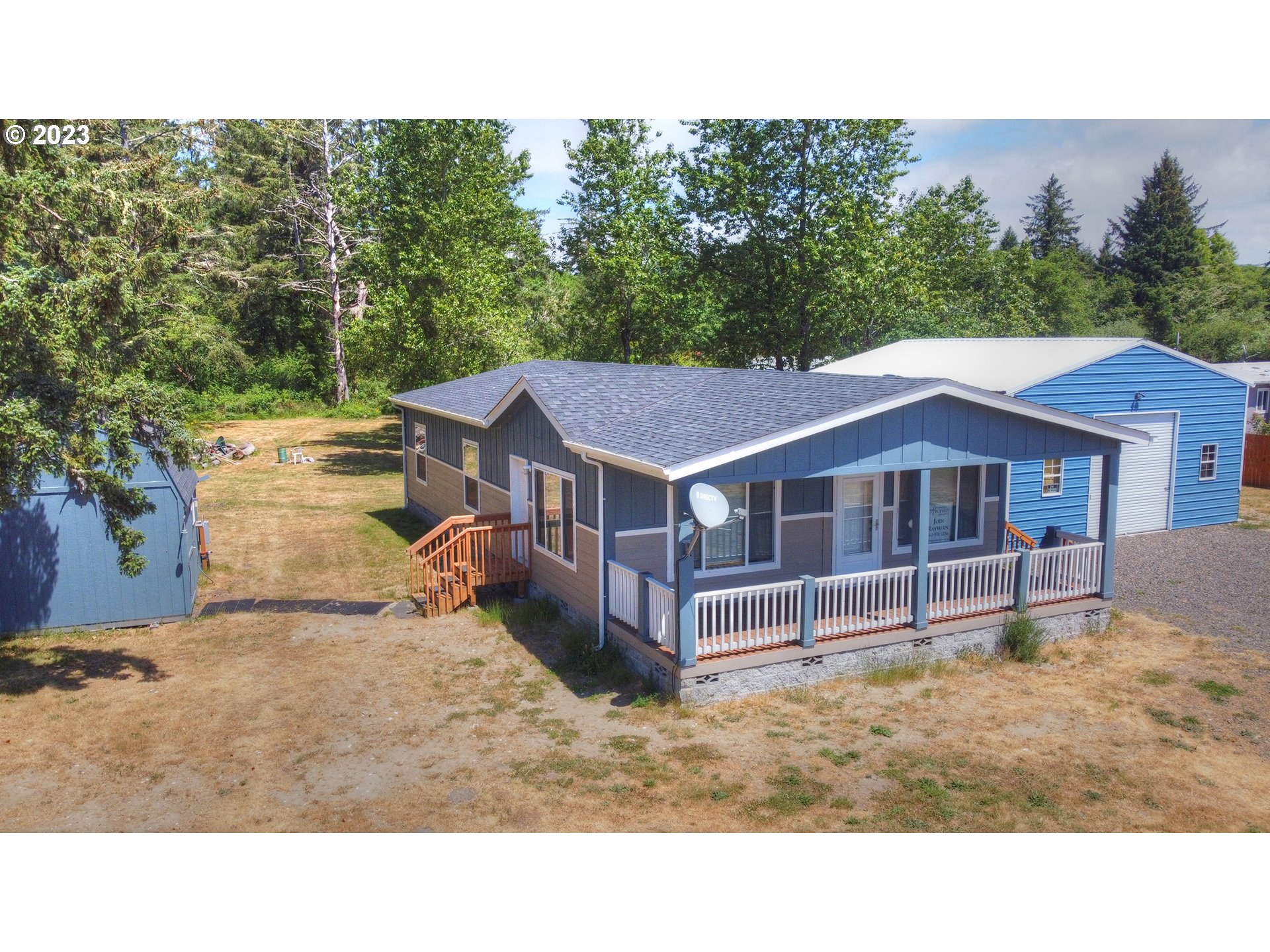 136 Stringtown Road Ilwaco, WA 98624 - Photo 1 of 47 a house view with a garden space