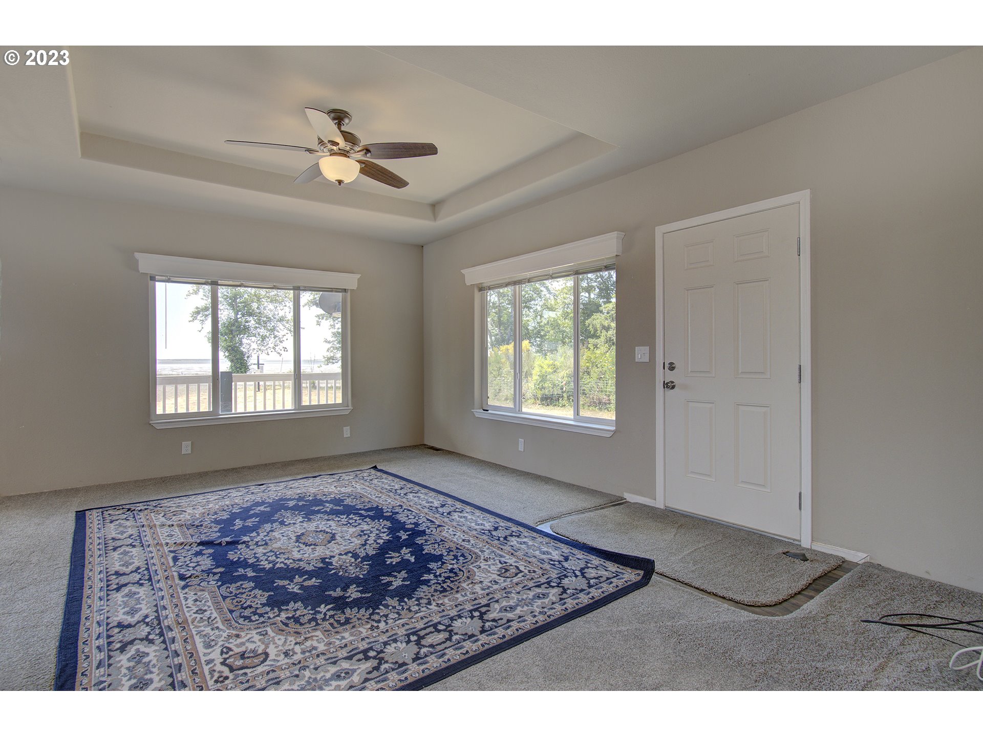 136 Stringtown Road Ilwaco, WA 98624 - Photo 11 of 47 a view of an empty room with a window