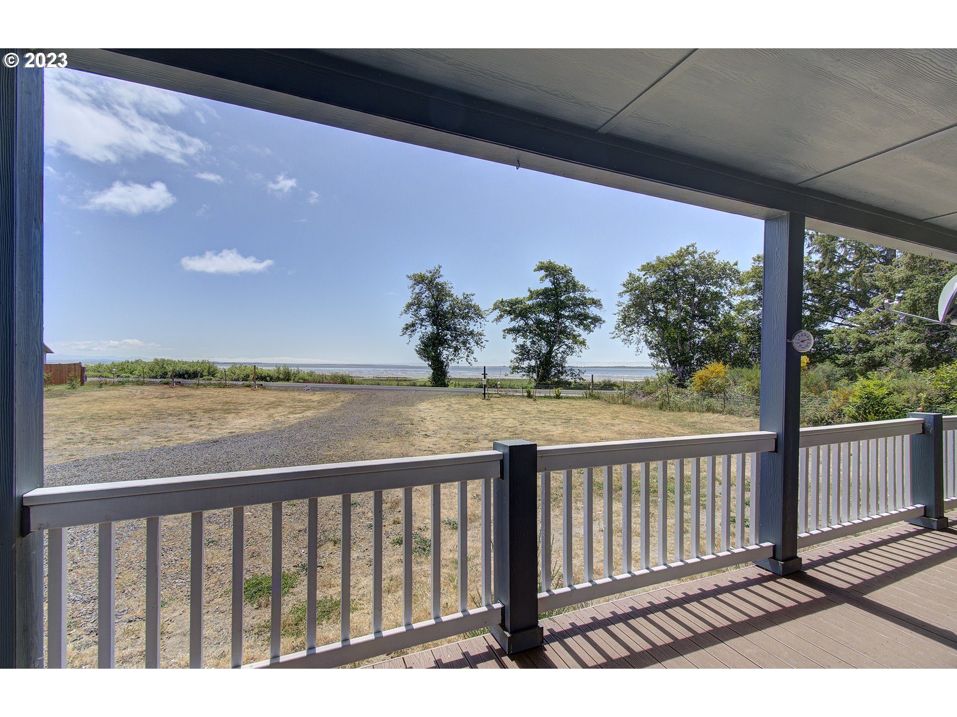 136 Stringtown Road Ilwaco, WA 98624 - Photo 6 of 47 a city view from a balcony