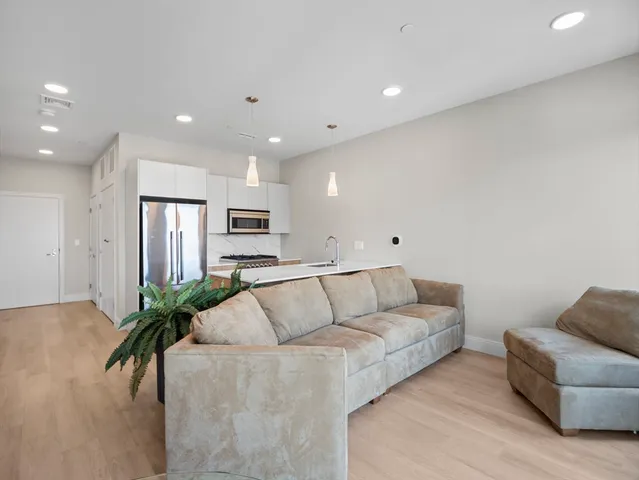 a living room with furniture and a couch
