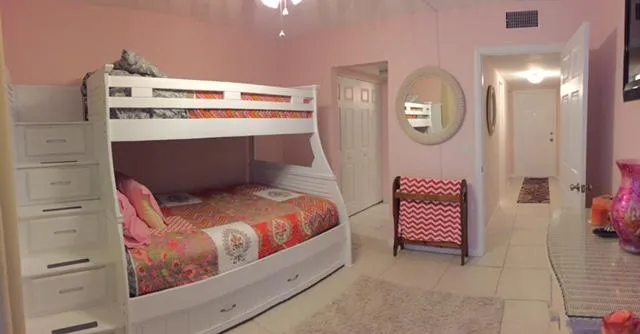 a kitchen with a cabinets a sink and appliances