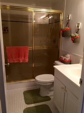 a living room with furniture and a chair