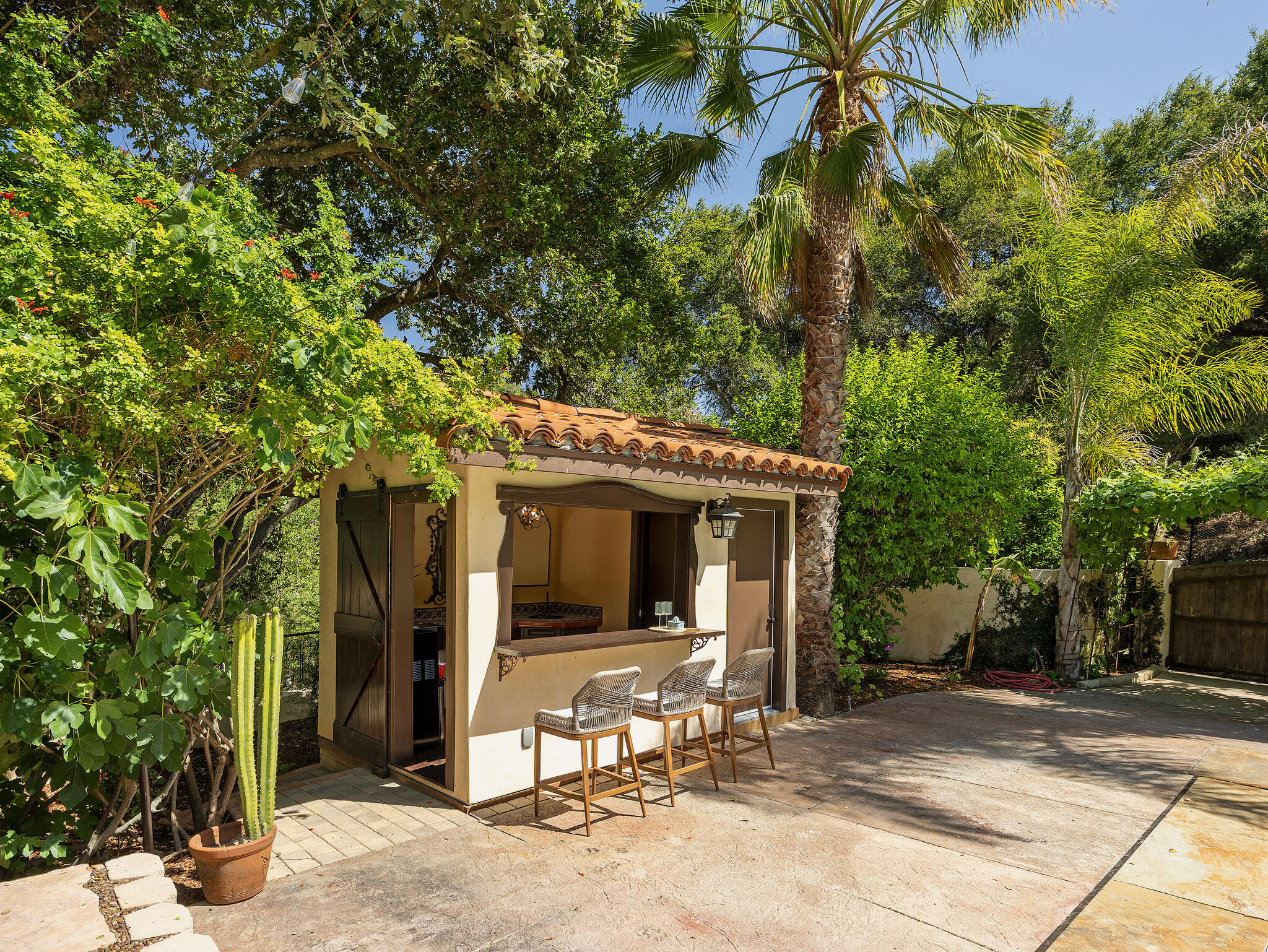 1493 Sycamore Canyon Road Montecito, CA 93108 - Photo 38 of 47 a front view of a house with a yard