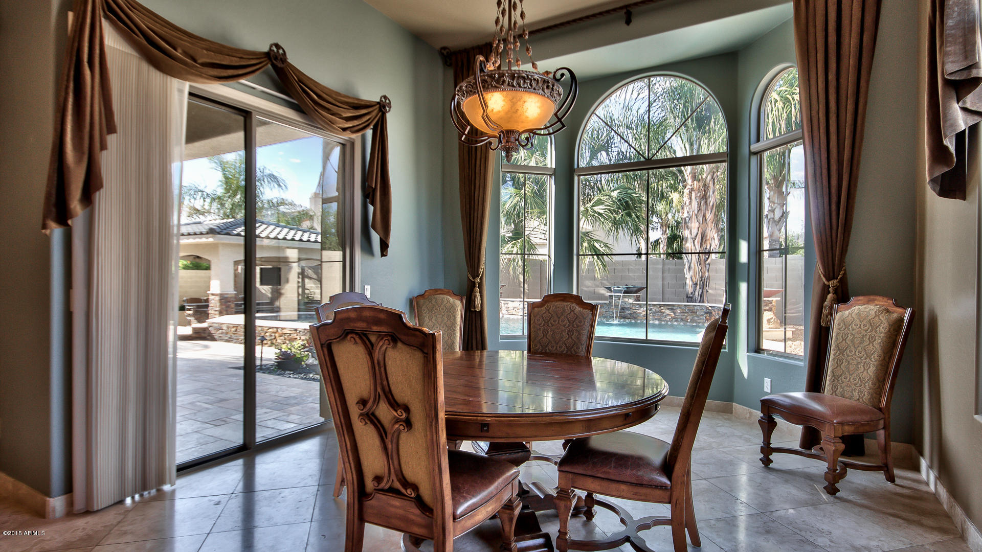 4782 East Buckboard Road Gilbert, AZ 85297 - Photo 12 of 57 a view of a dining room with furniture window and outside view