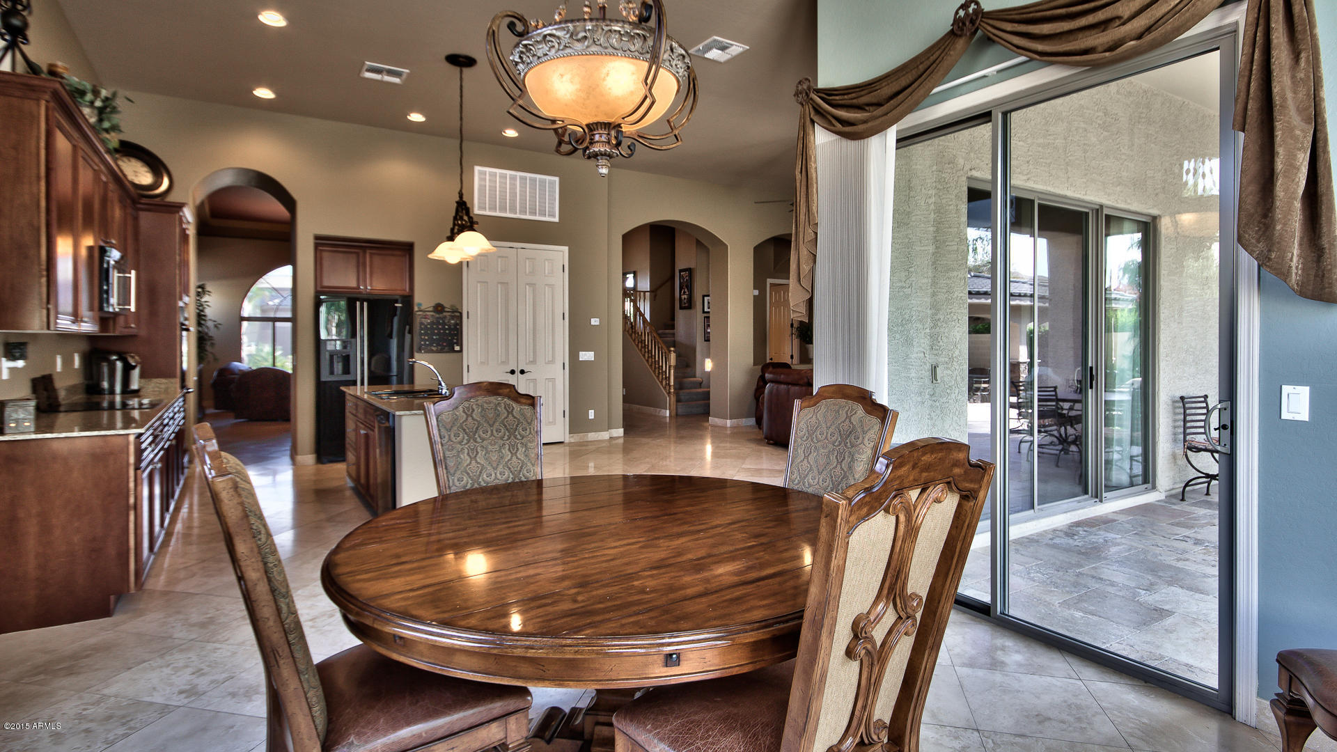 4782 East Buckboard Road Gilbert, AZ 85297 - Photo 13 of 57 a dining room with furniture and wooden floor
