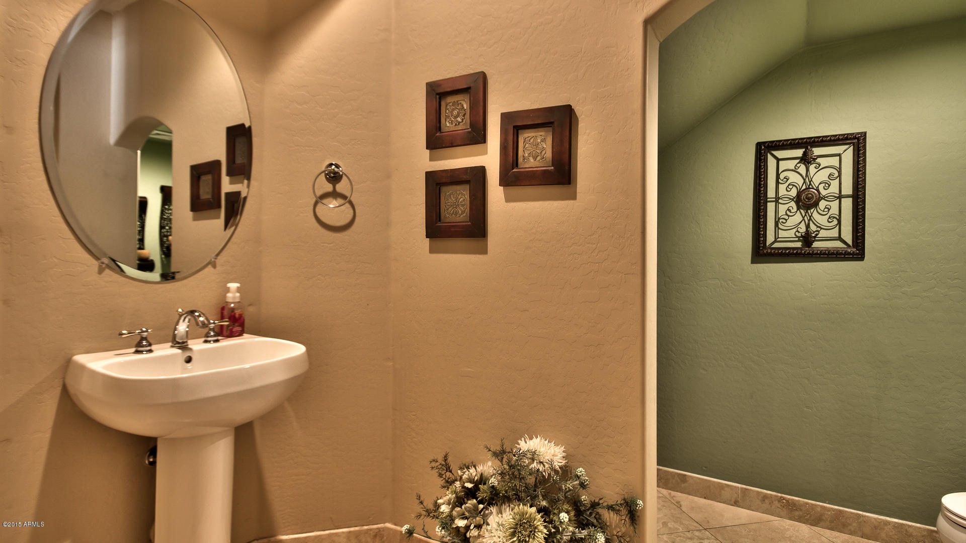 4782 East Buckboard Road Gilbert, AZ 85297 - Photo 18 of 57 a bathroom with a sink and a mirror