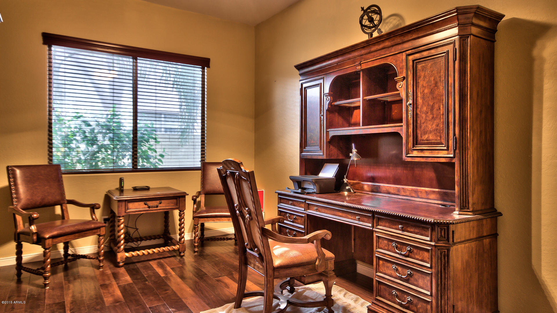 4782 East Buckboard Road Gilbert, AZ 85297 - Photo 23 of 57 a view of a workspace with furniture and a window