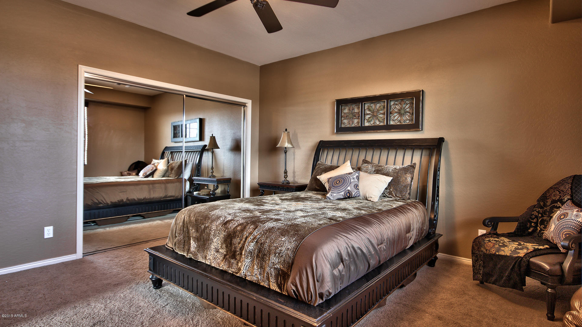 4782 East Buckboard Road Gilbert, AZ 85297 - Photo 26 of 57 a bed room with a bed and a chair