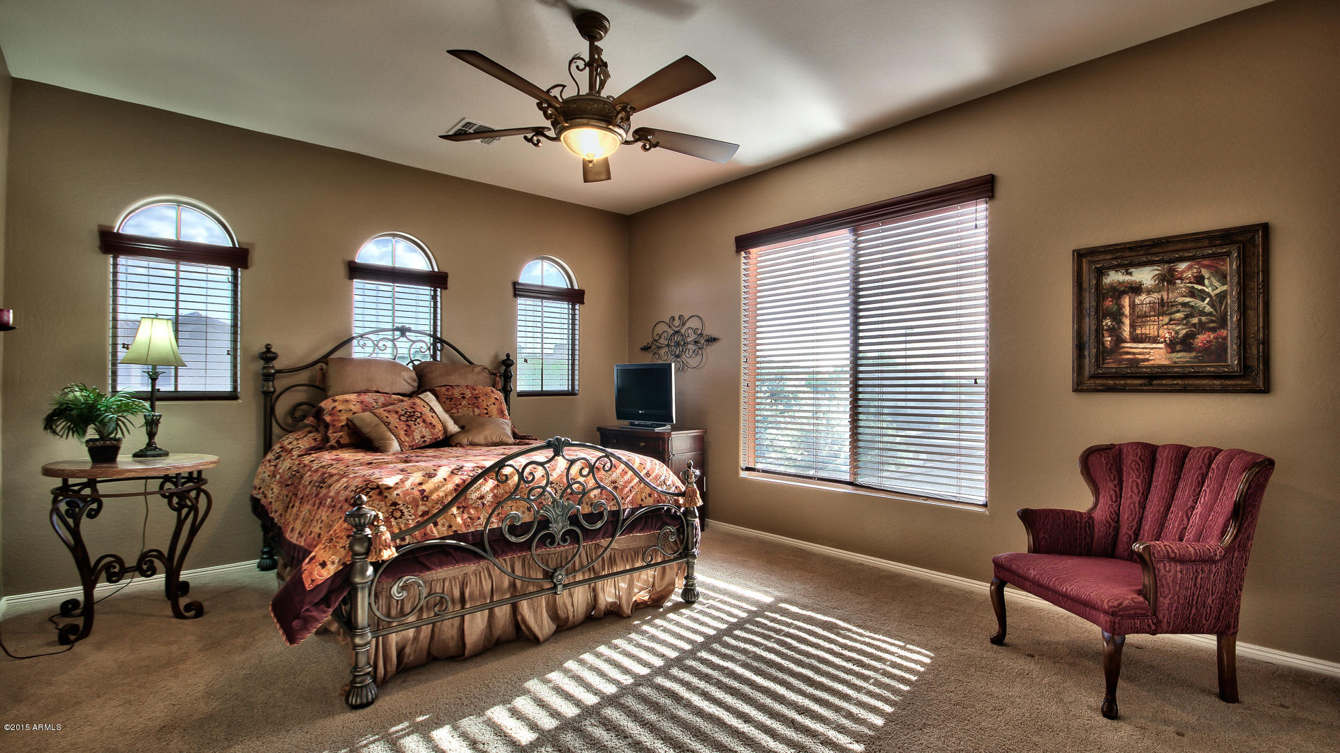 4782 East Buckboard Road Gilbert, AZ 85297 - Photo 28 of 57 a bed room with a bed and a chair