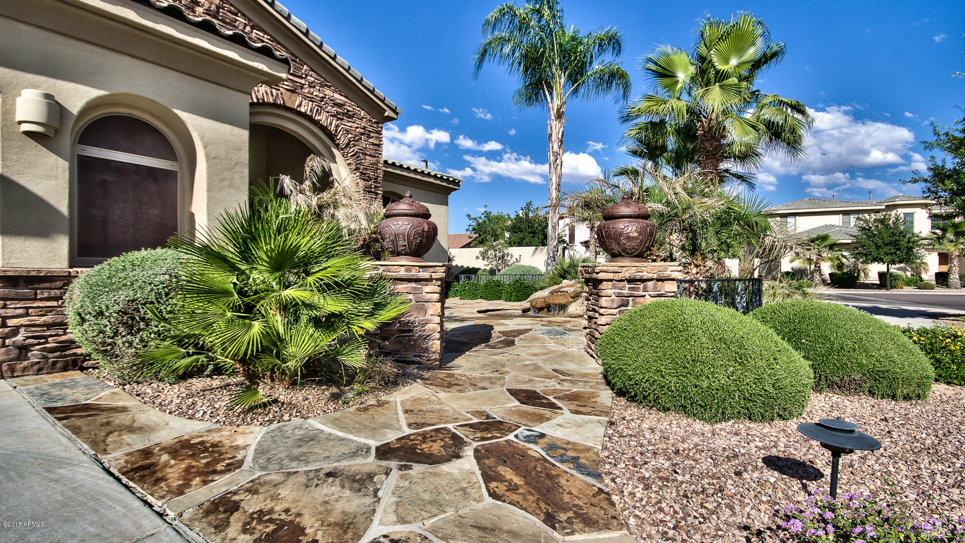 4782 East Buckboard Road Gilbert, AZ 85297 - Photo 3 of 57 a view of a garden with a pathway