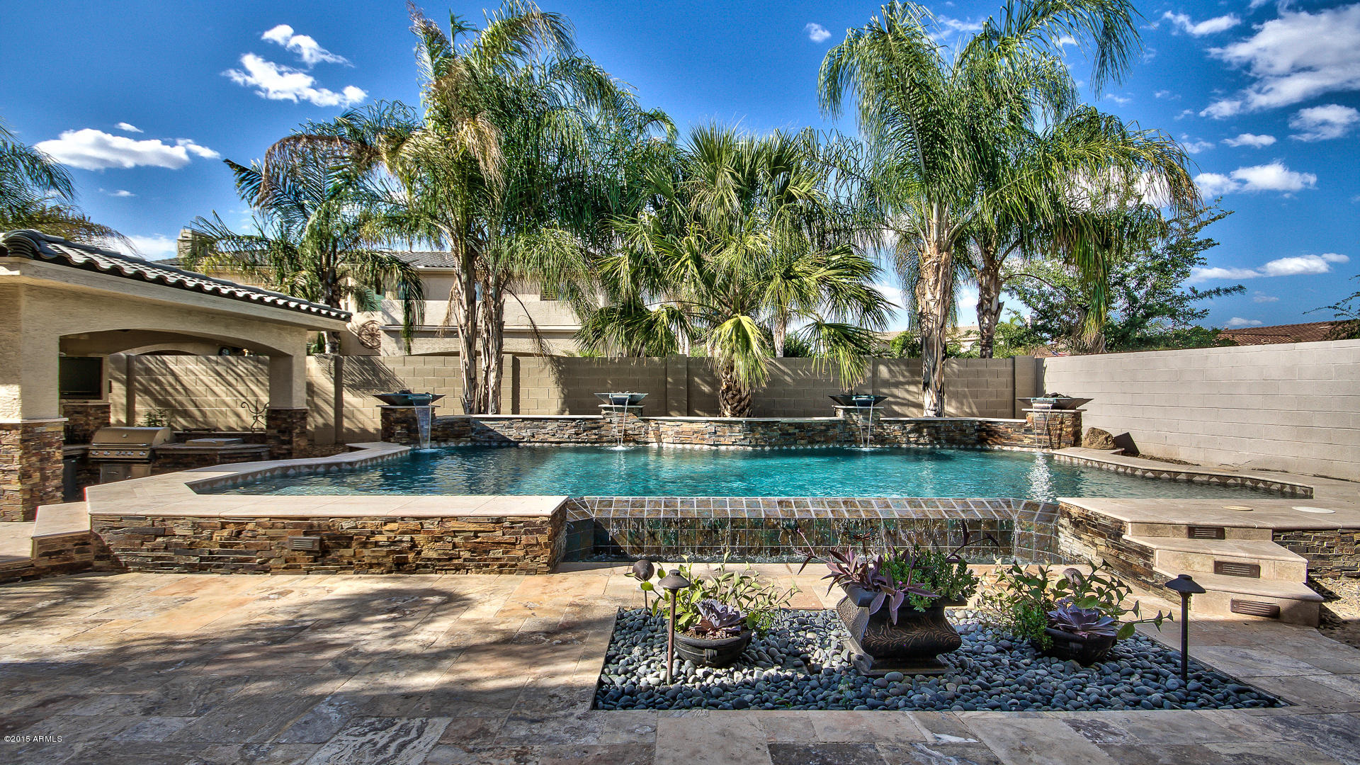 4782 East Buckboard Road Gilbert, AZ 85297 - Photo 35 of 57 a view of a house with a yard