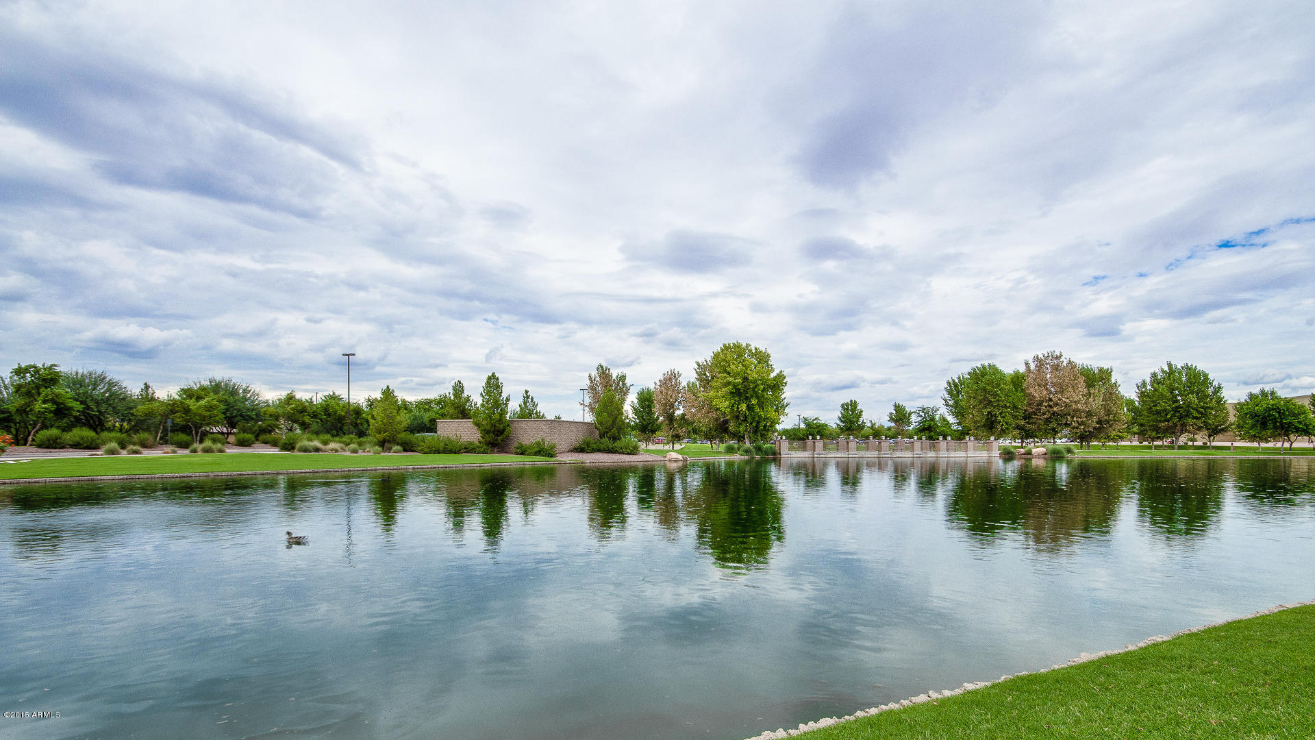4782 East Buckboard Road Gilbert, AZ 85297 - Photo 45 of 57 a view of a lake with houses with lake and city view