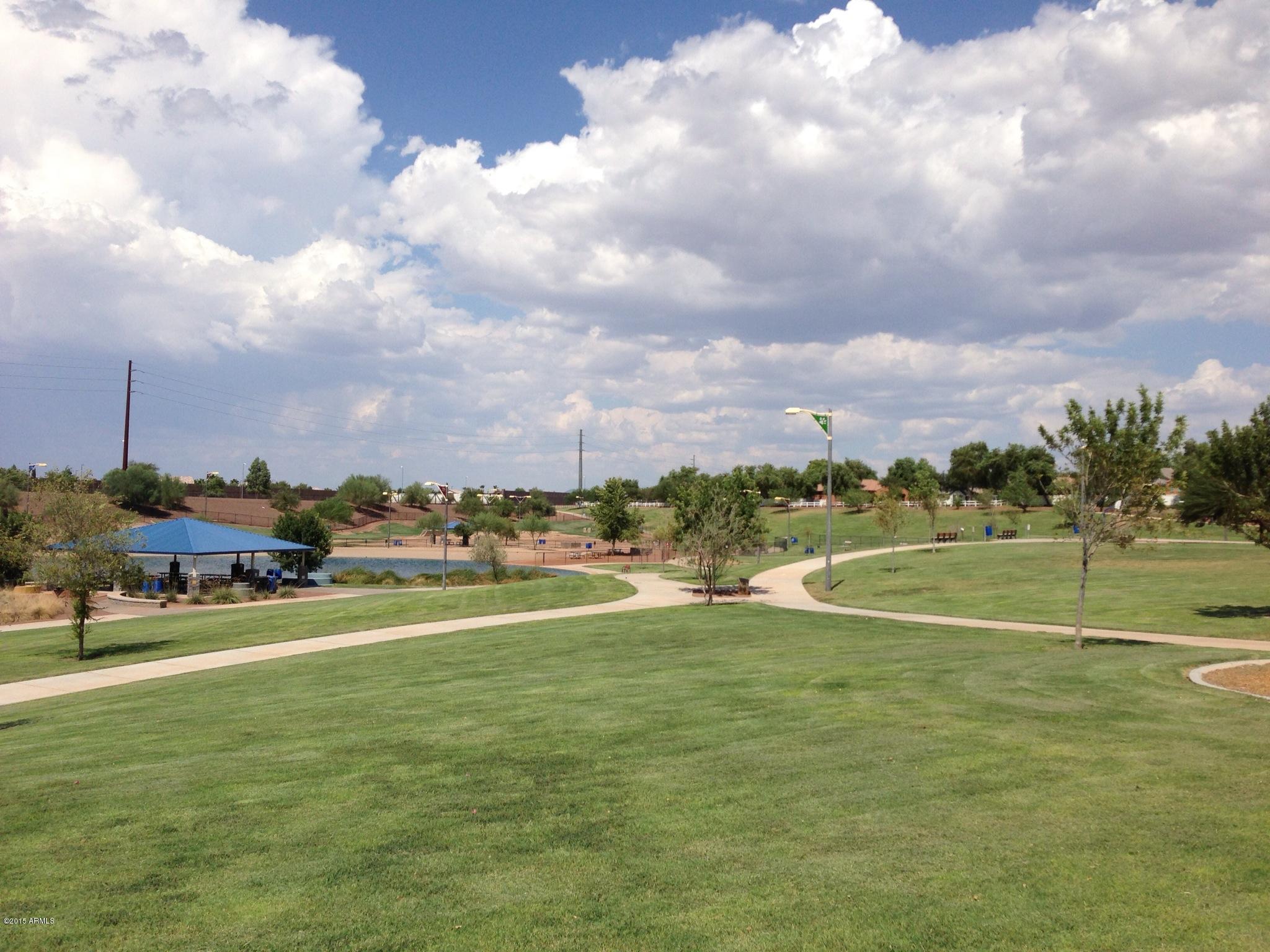 4782 East Buckboard Road Gilbert, AZ 85297 - Photo 50 of 57 a view of an ocean with beach and outdoor seating