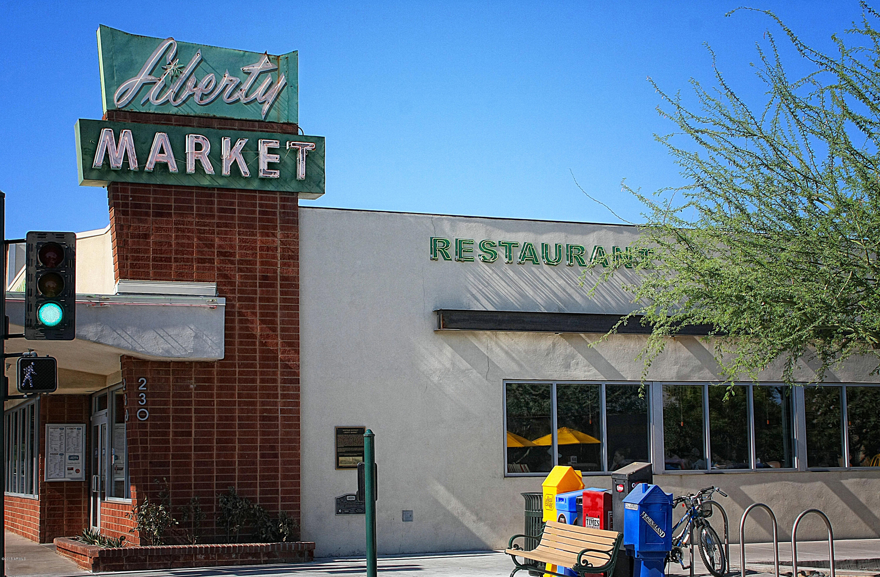 4782 East Buckboard Road Gilbert, AZ 85297 - Photo 56 of 57 a front view of a building with retail shops