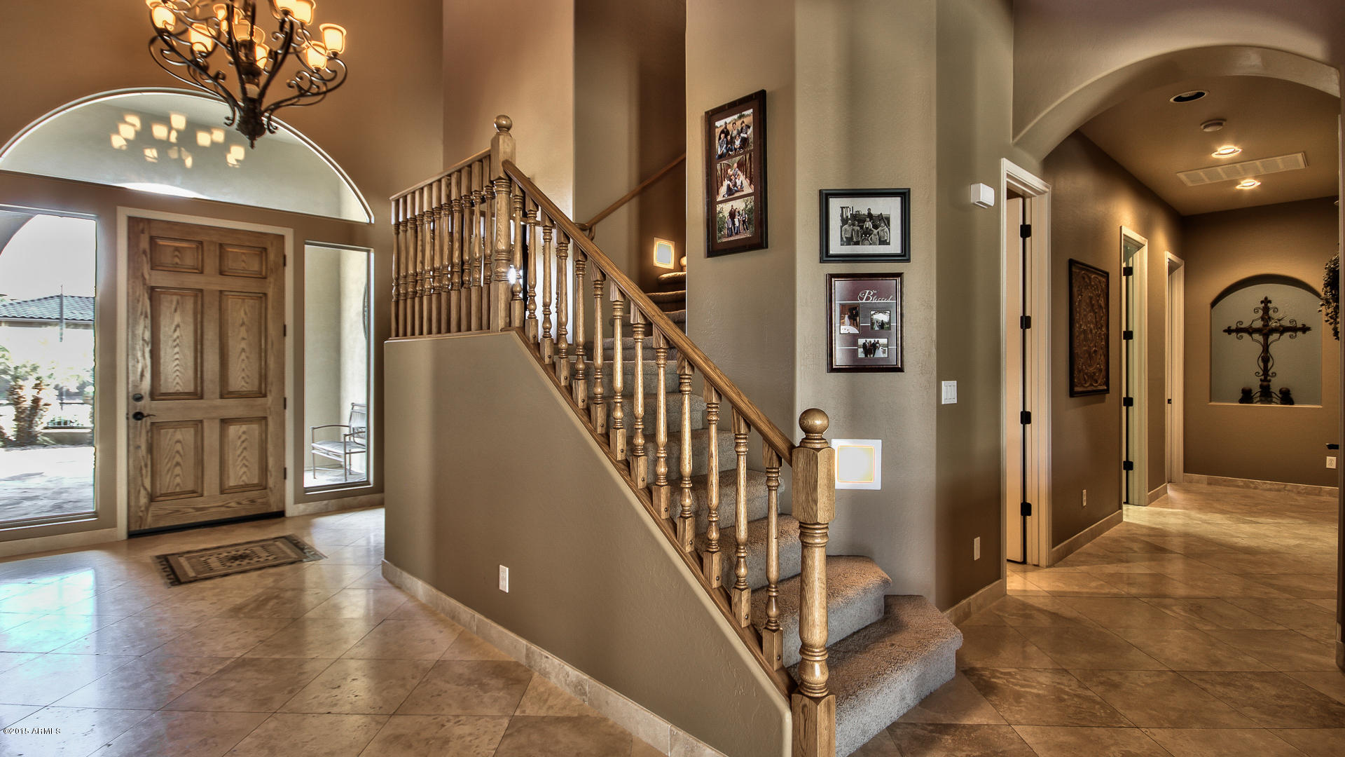 4782 East Buckboard Road Gilbert, AZ 85297 - Photo 6 of 57 a view of a hallway with entryway wooden floor and livingroom view