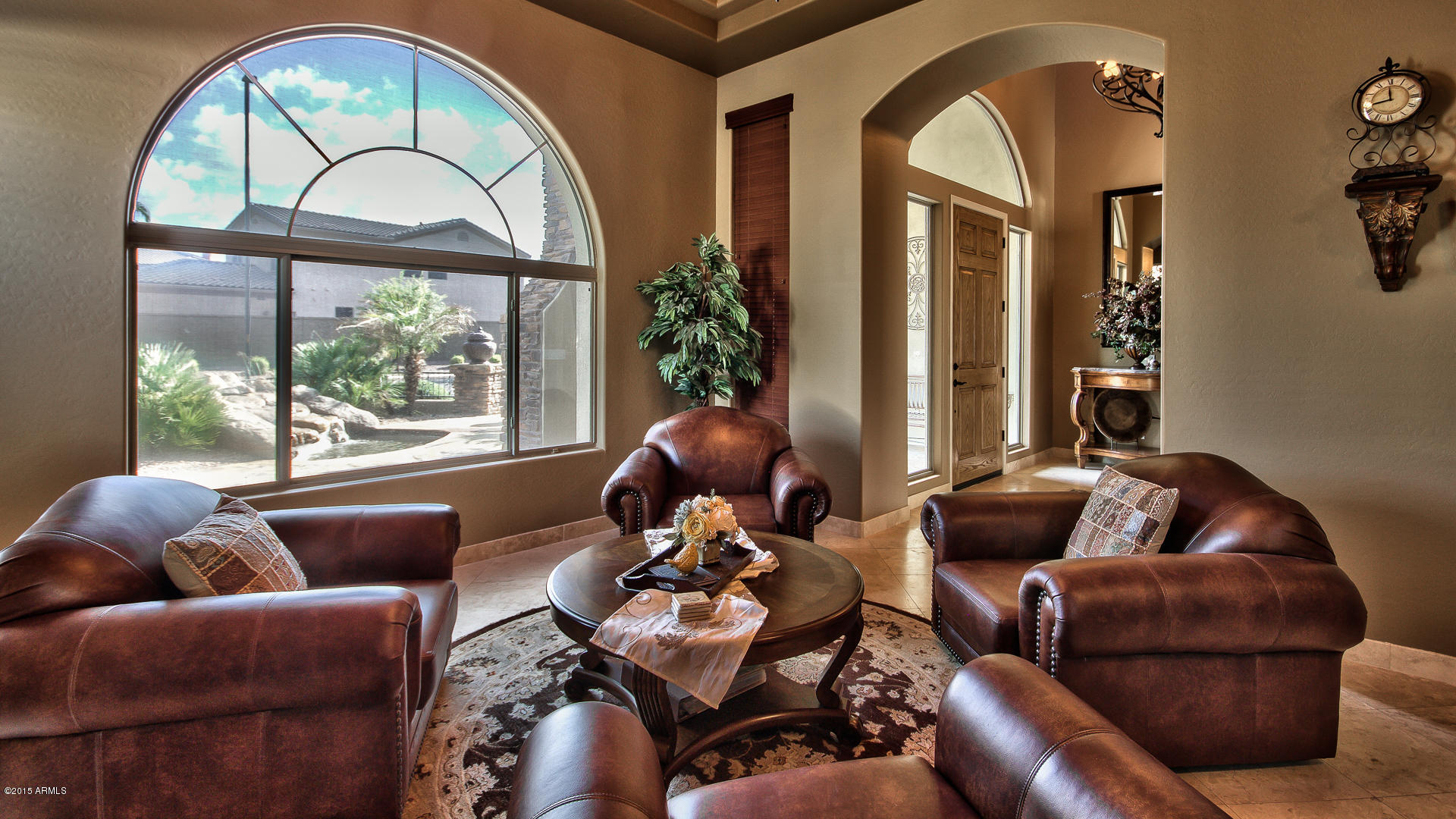 4782 East Buckboard Road Gilbert, AZ 85297 - Photo 8 of 57 a living room with furniture and a large window