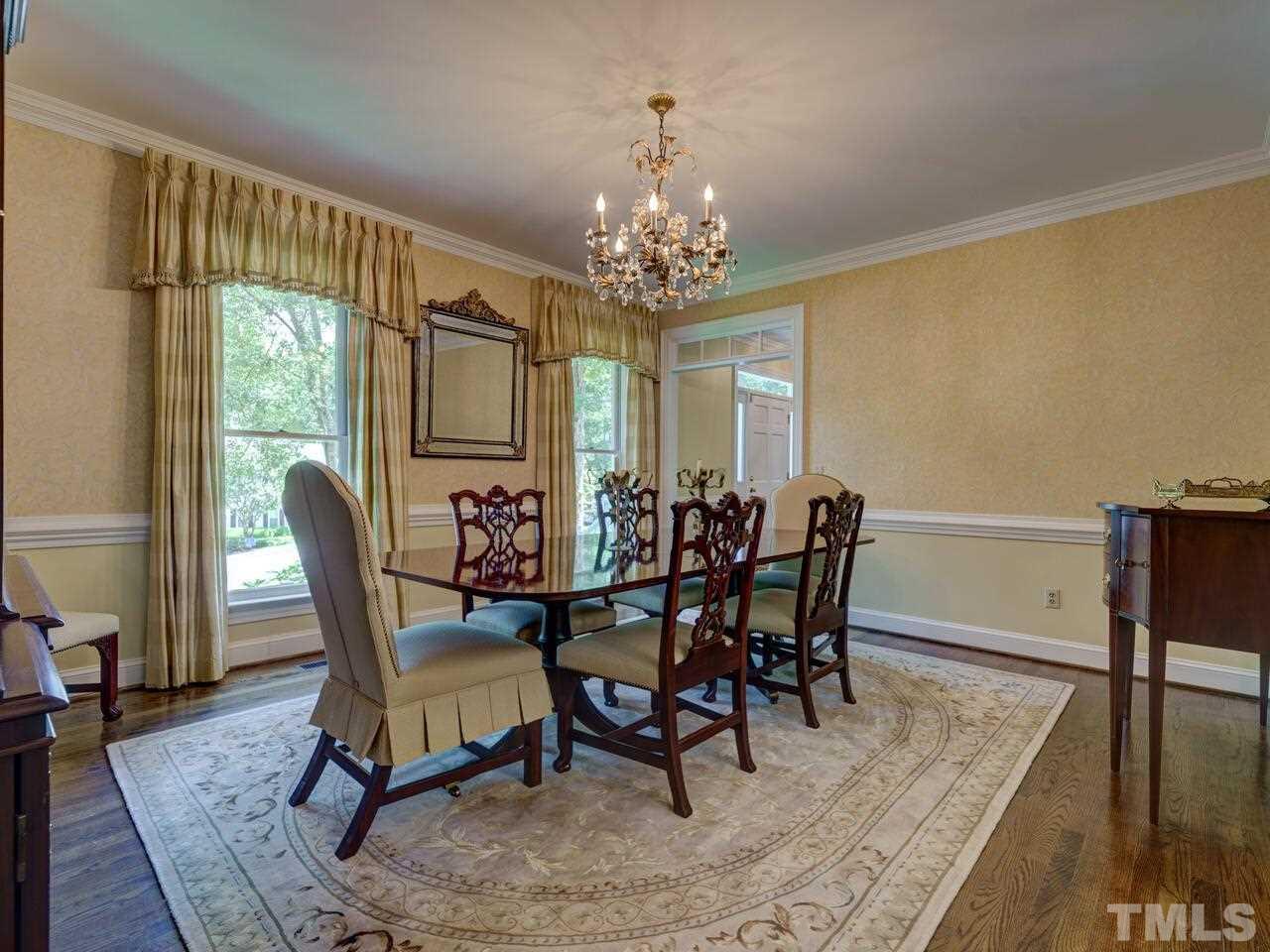 4113 Colville Road Durham, NC 27707 - Photo 11 of 30 Chandelier does not convey. Replacement in attic.