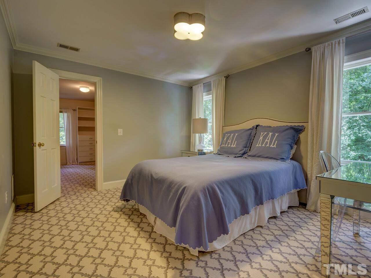 4113 Colville Road Durham, NC 27707 - Photo 21 of 30 Third bedroom has a spacious walk-in closet.