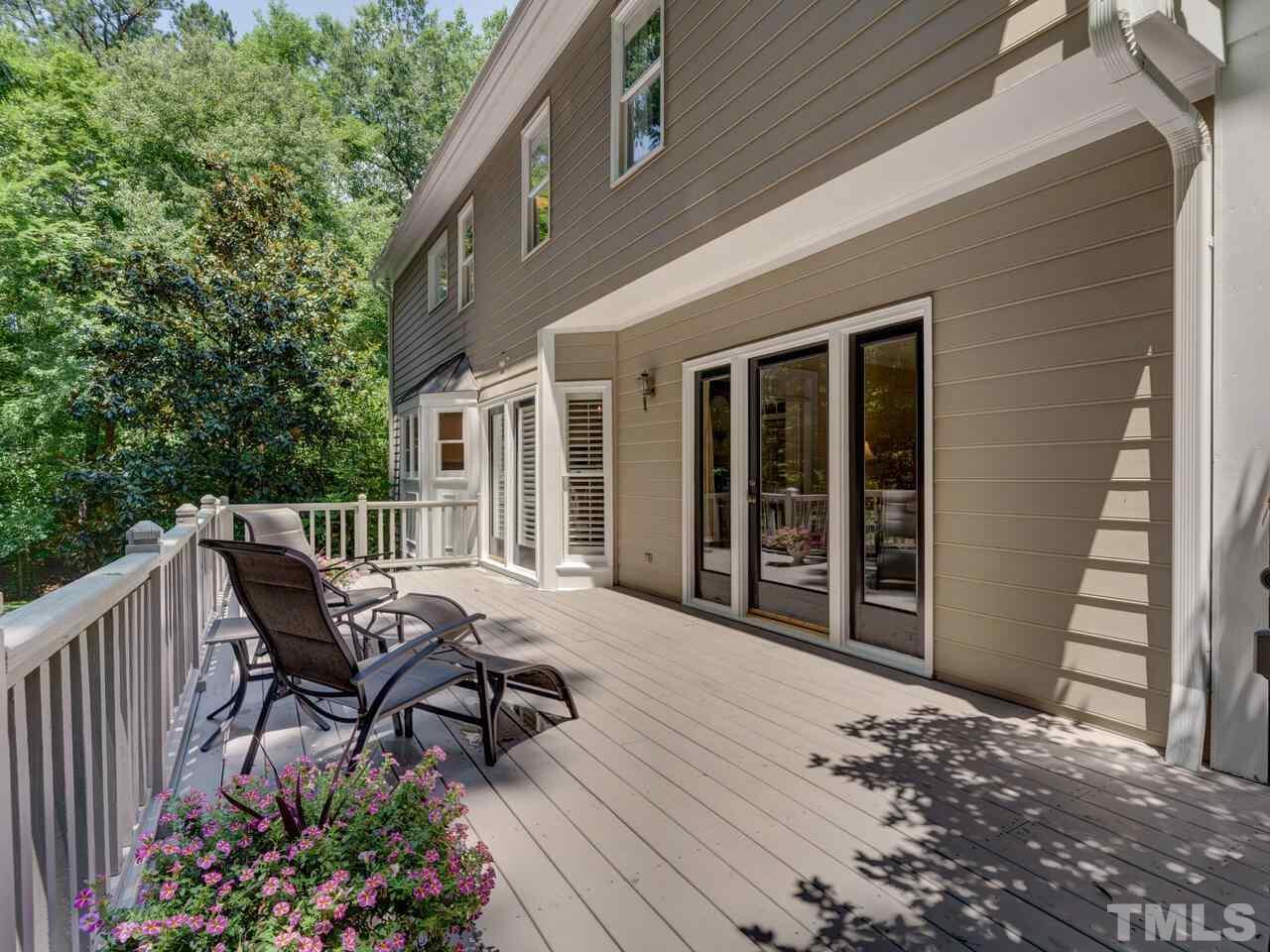 4113 Colville Road Durham, NC 27707 - Photo 30 of 30 Runs across the rear of the home and provides an outdoor escape.