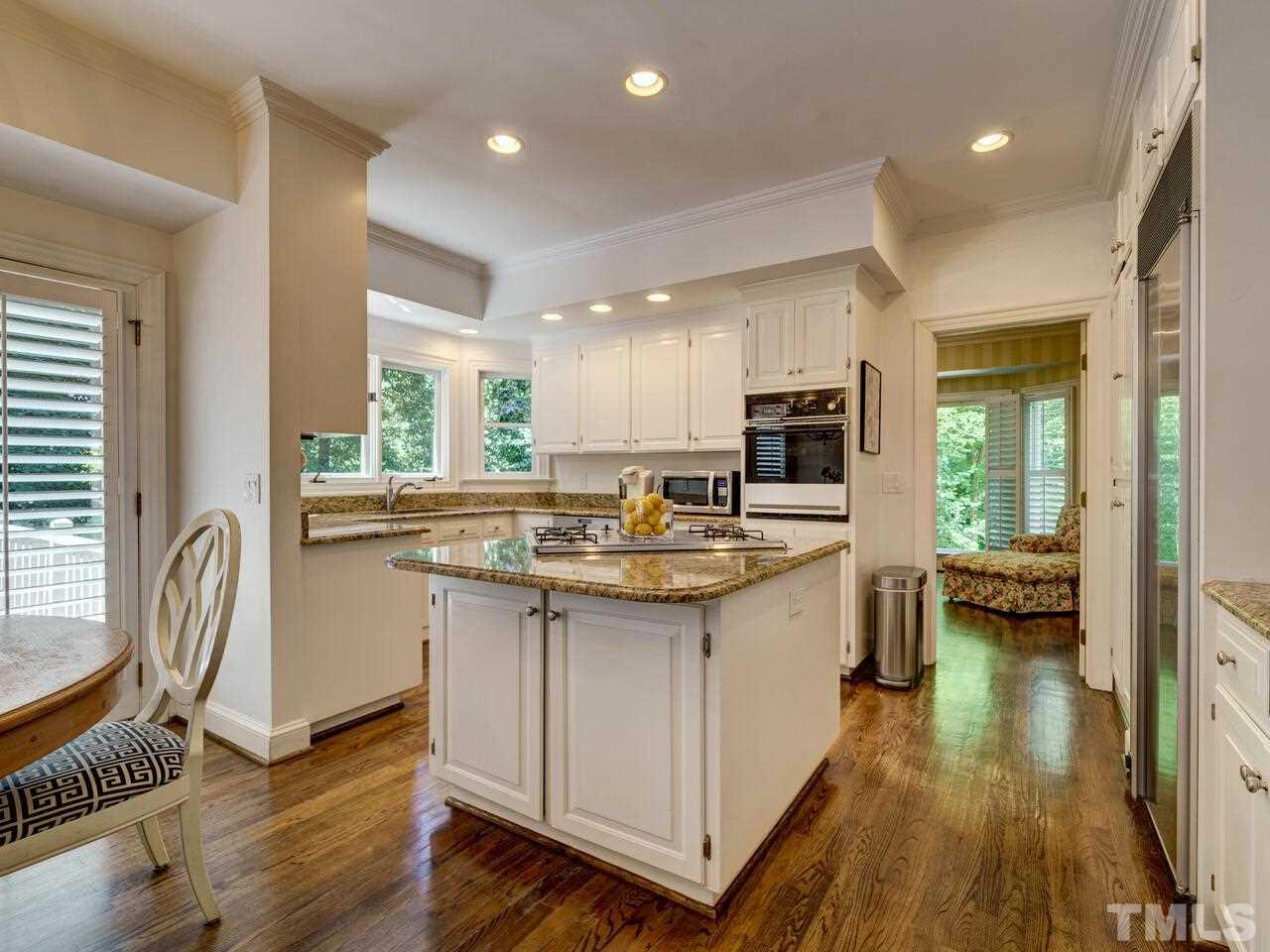 Kitchen with study behind and breakfast room on left.