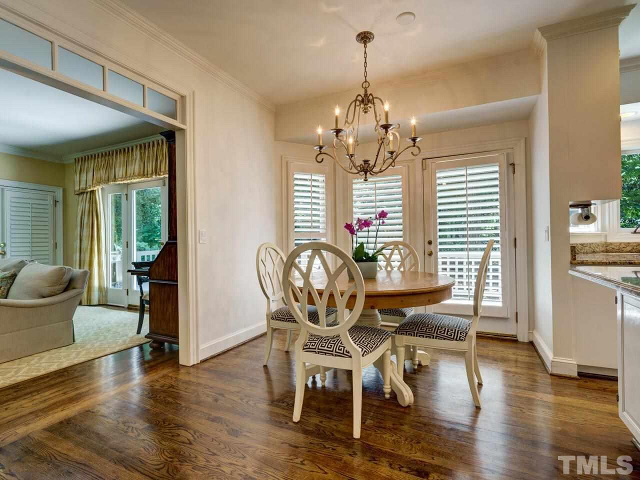 4113 Colville Road Durham, NC 27707 - Photo 8 of 30 Breakfast room opens to Living Room and to Deck.