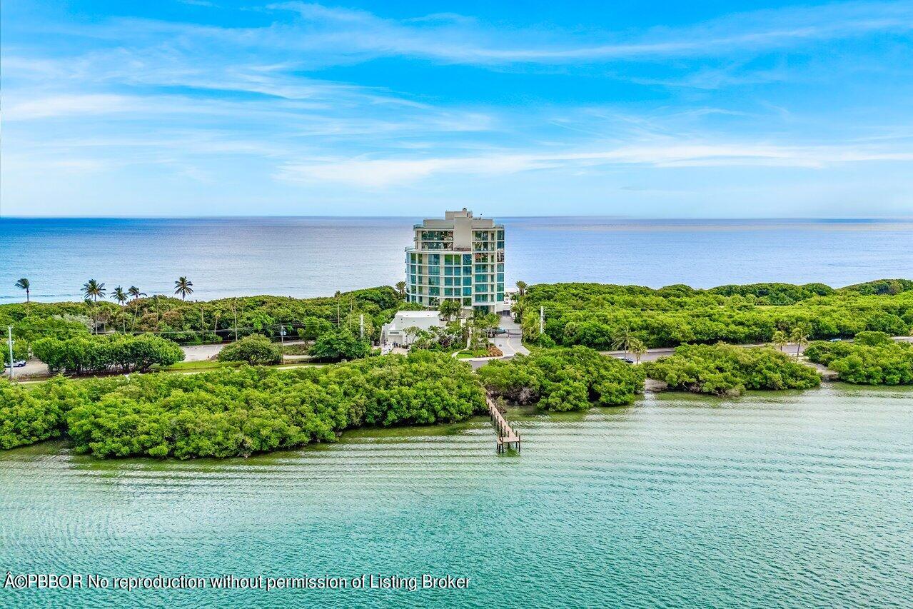 1500 South Beach Road, Unit 301 Tequesta, FL 33469 - Photo 2 of 28 a view of a lake