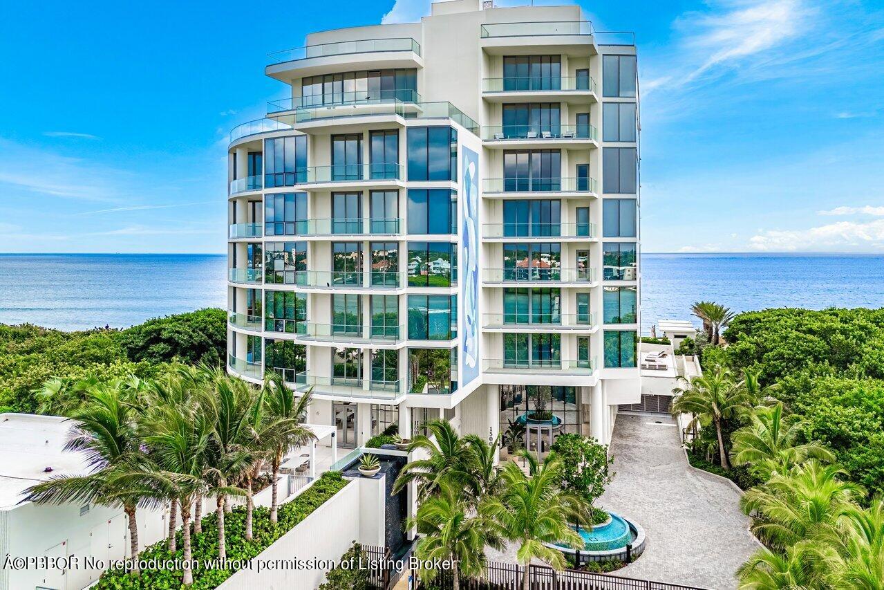 1500 South Beach Road, Unit 301 Tequesta, FL 33469 - Photo 24 of 28 a front view of a multi story building