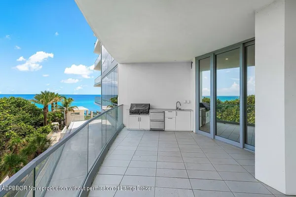 a view of a balcony with an open space