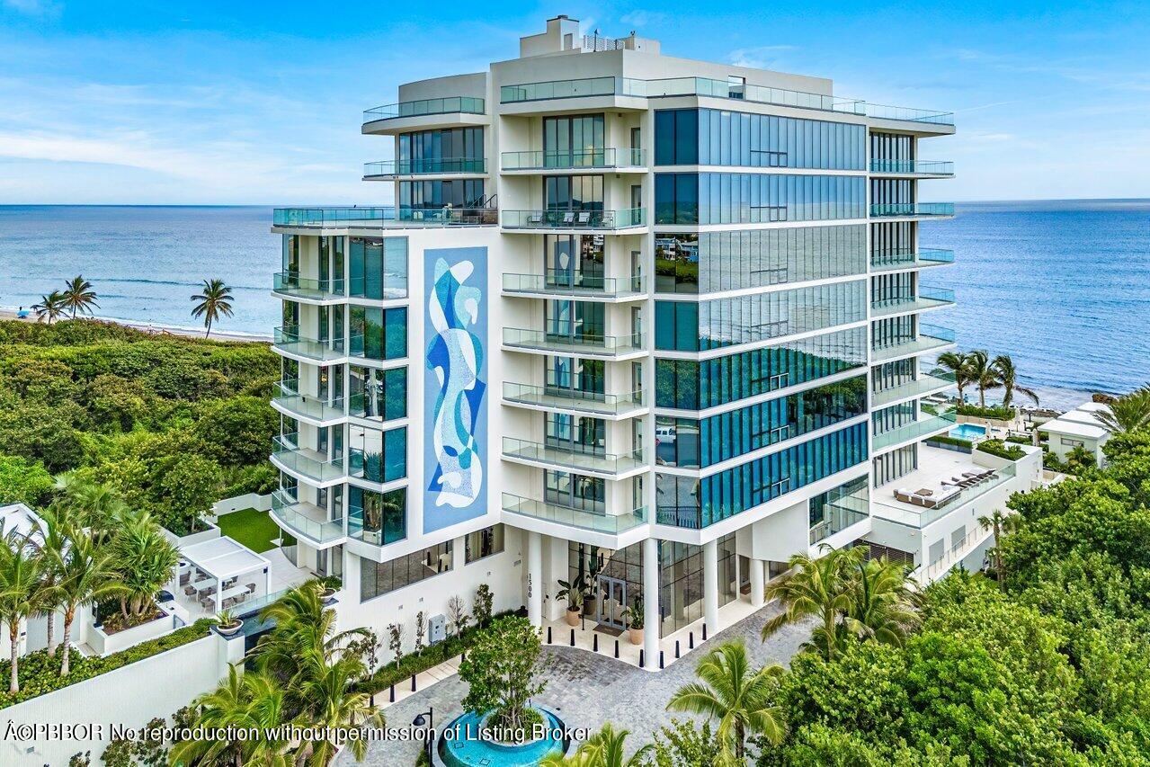 1500 South Beach Road, Unit 301 Tequesta, FL 33469 - Photo 4 of 28 a tall building with a large window