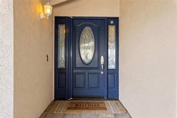 a view of a door with a hallway