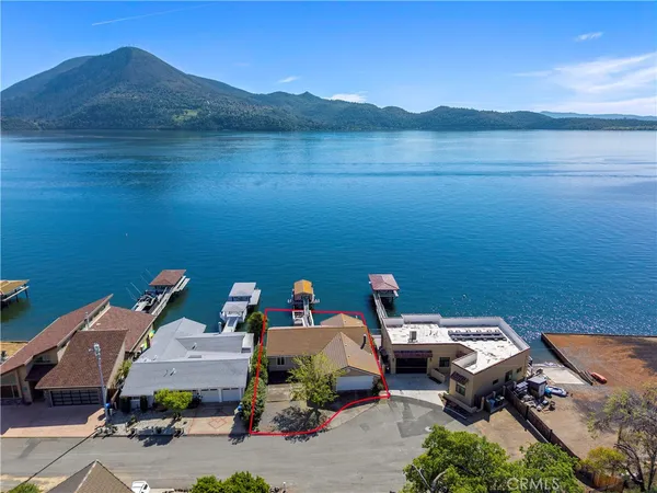 a view of a terrace with a table and chairs
