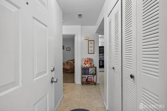 a view of a livingroom with baby furniture
