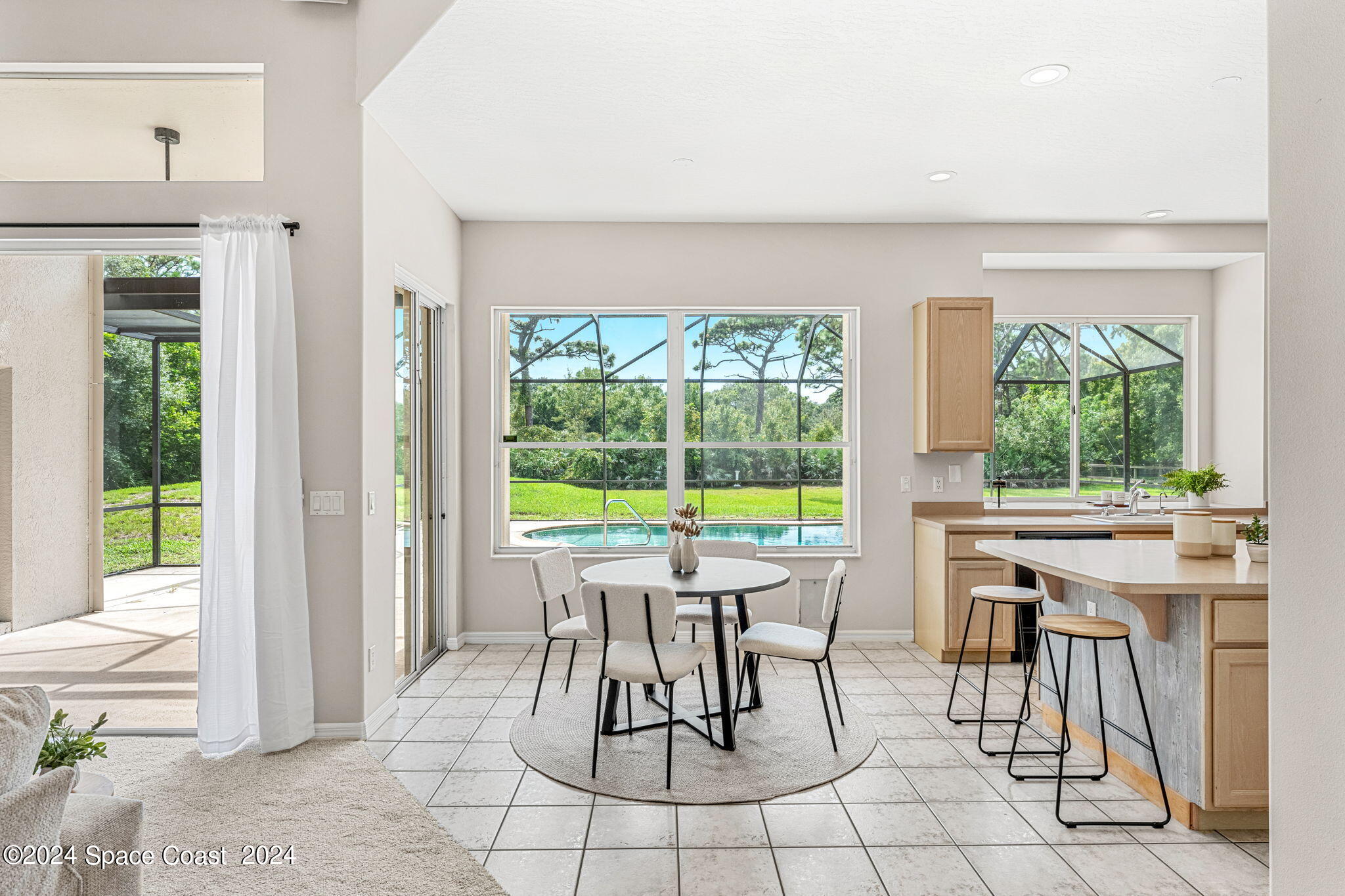 4140 Windover Way Melbourne, FL 32934 - Photo 11 of 53 a view of a dining room with furniture window and outside view