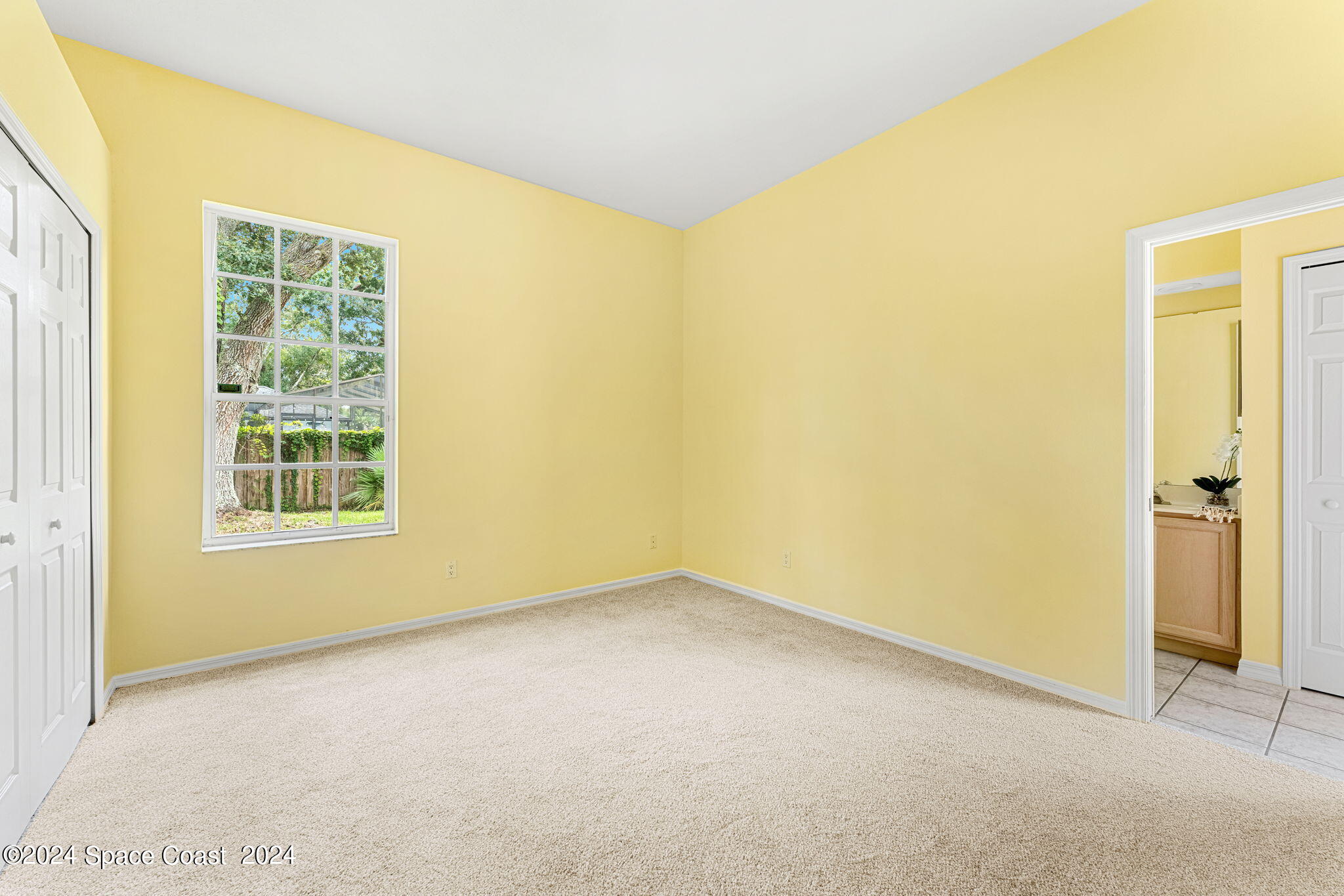 4140 Windover Way Melbourne, FL 32934 - Photo 23 of 53 an empty room with windows