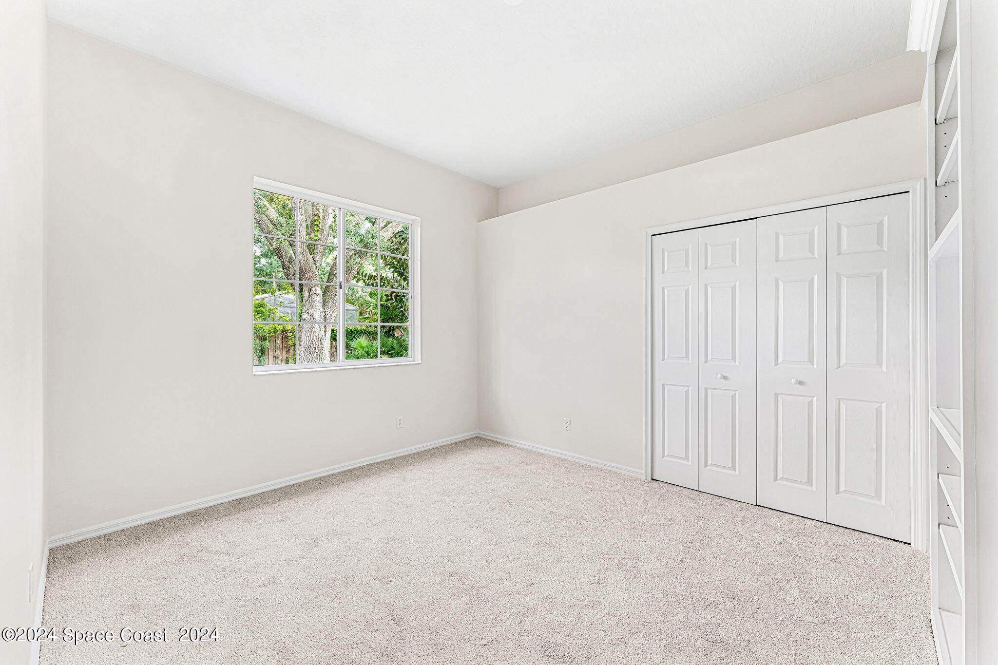 4140 Windover Way Melbourne, FL 32934 - Photo 25 of 53 an empty room with a window