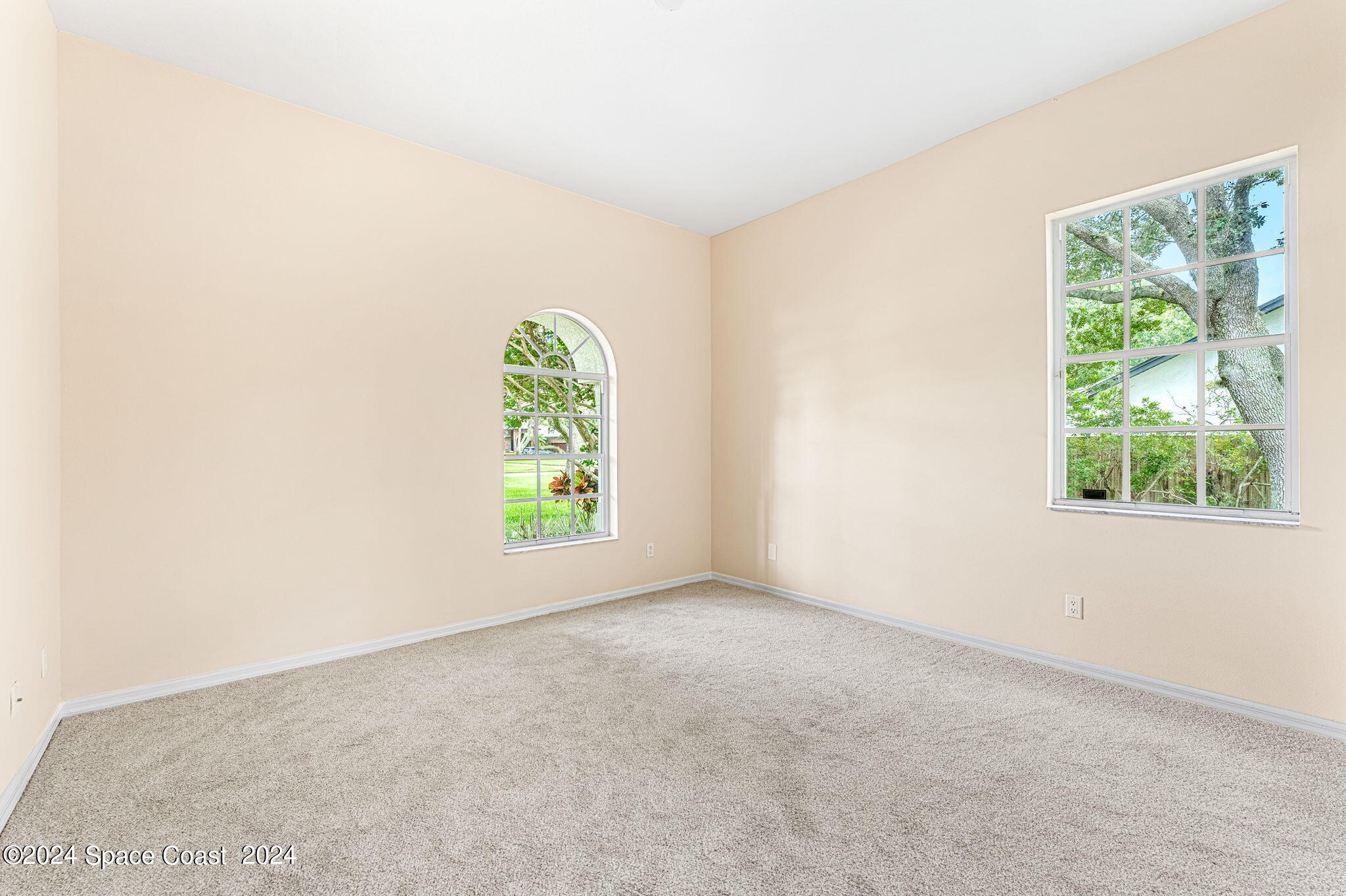 4140 Windover Way Melbourne, FL 32934 - Photo 27 of 53 an empty room with windows
