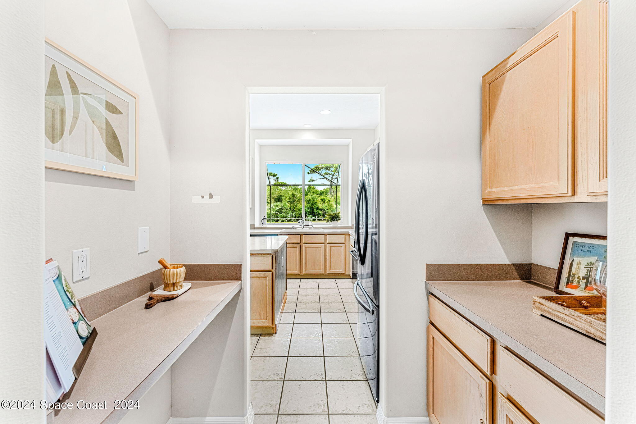 4140 Windover Way Melbourne, FL 32934 - Photo 29 of 53 a kitchen with a sink and a stove top oven