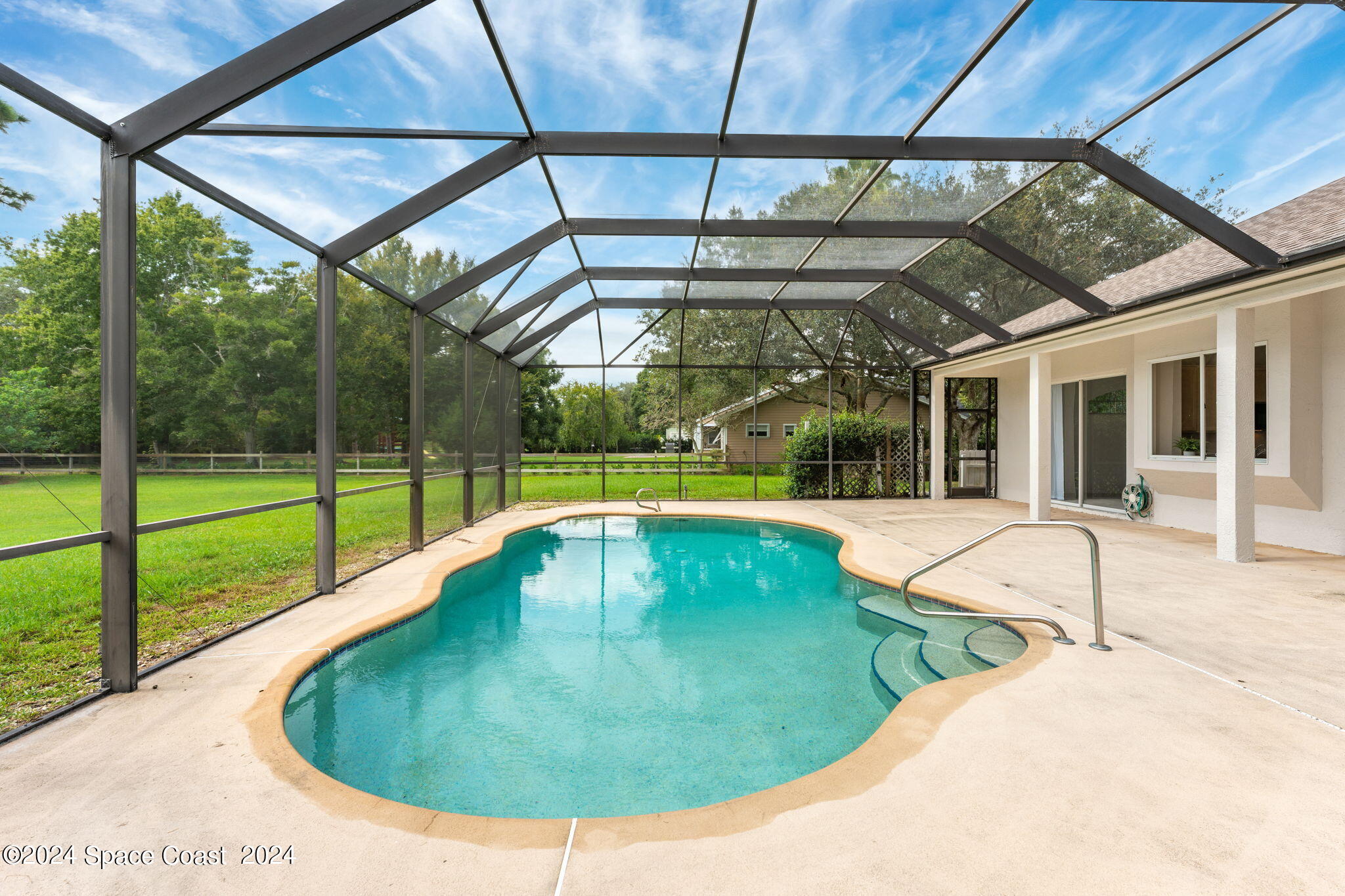 4140 Windover Way Melbourne, FL 32934 - Photo 33 of 53 a view of swimming pool with a backyard