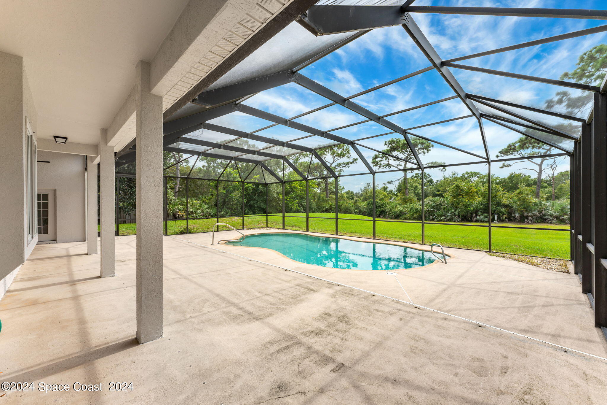 4140 Windover Way Melbourne, FL 32934 - Photo 36 of 53 a view of a swimming pool with a backyard