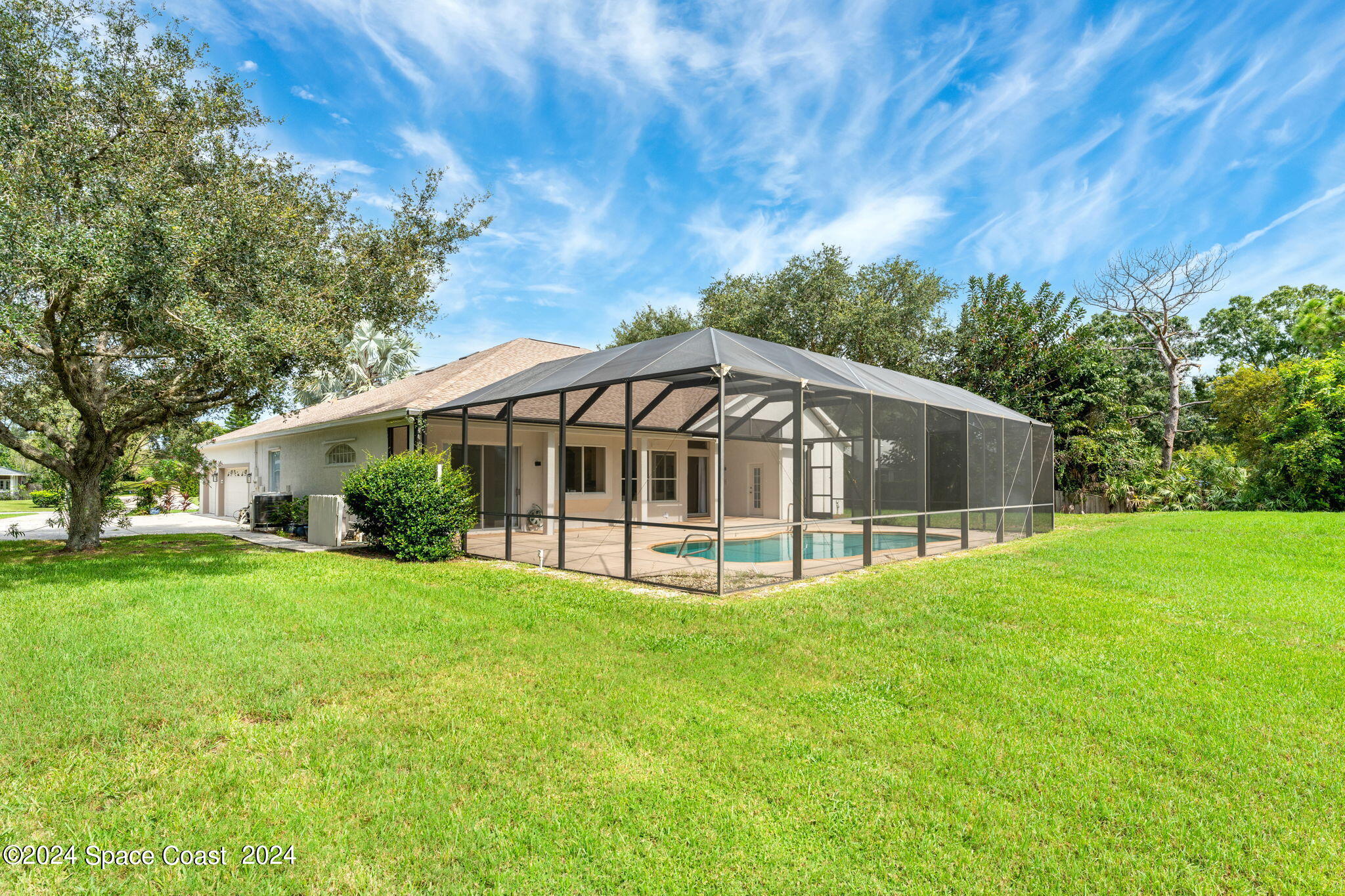 4140 Windover Way Melbourne, FL 32934 - Photo 37 of 53 a view of a house with a yard and sitting area