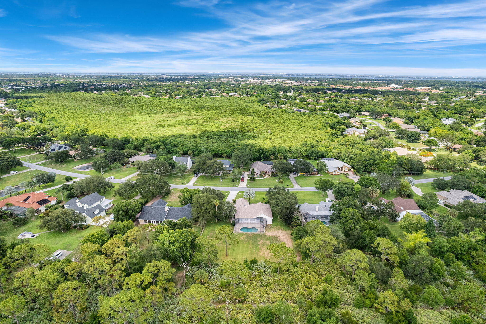4140 Windover Way Melbourne, FL 32934 - Photo 44 of 53 a view of a large yard with green space