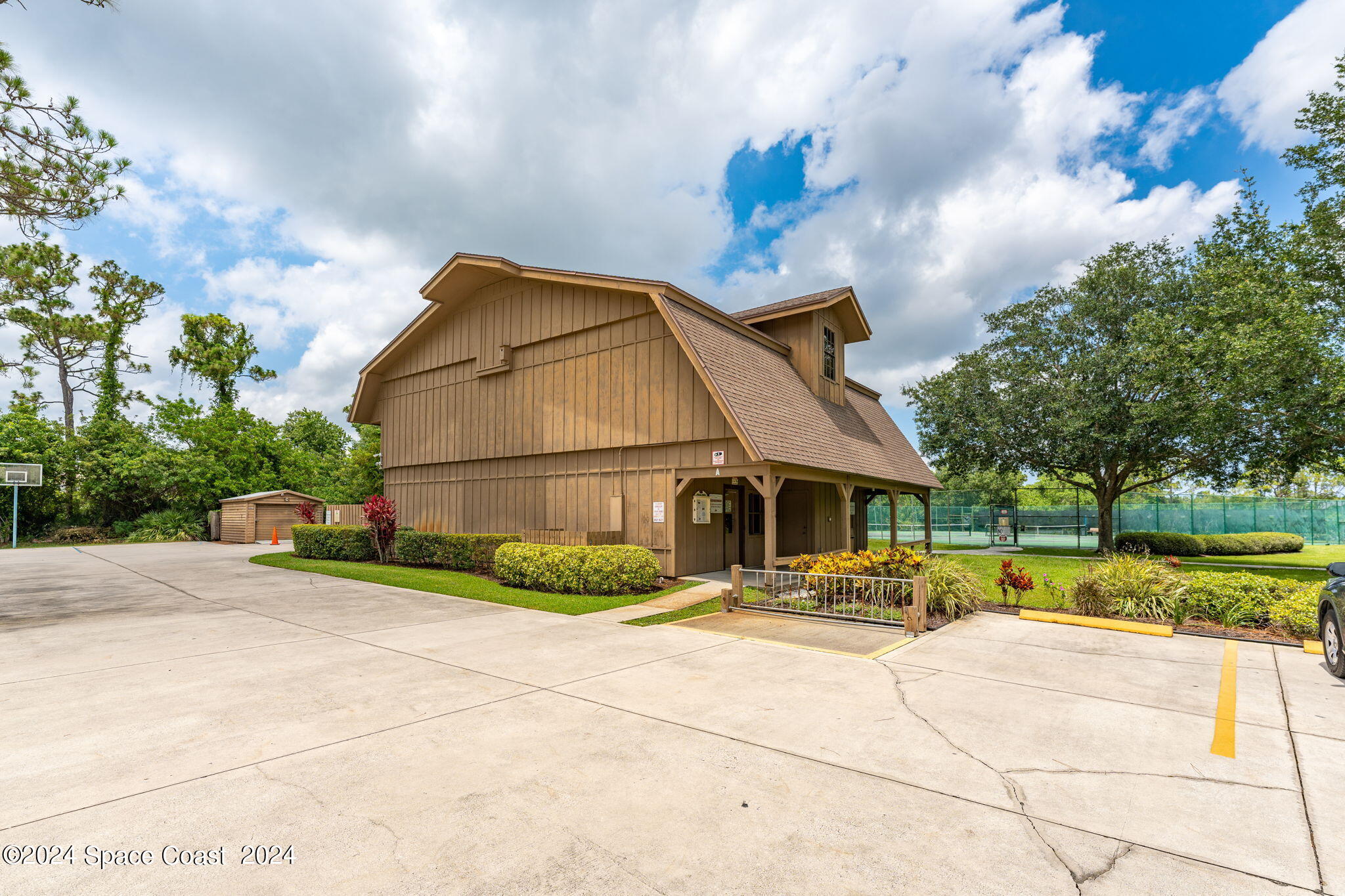 4140 Windover Way Melbourne, FL 32934 - Photo 47 of 53 a front view of a house with a yard