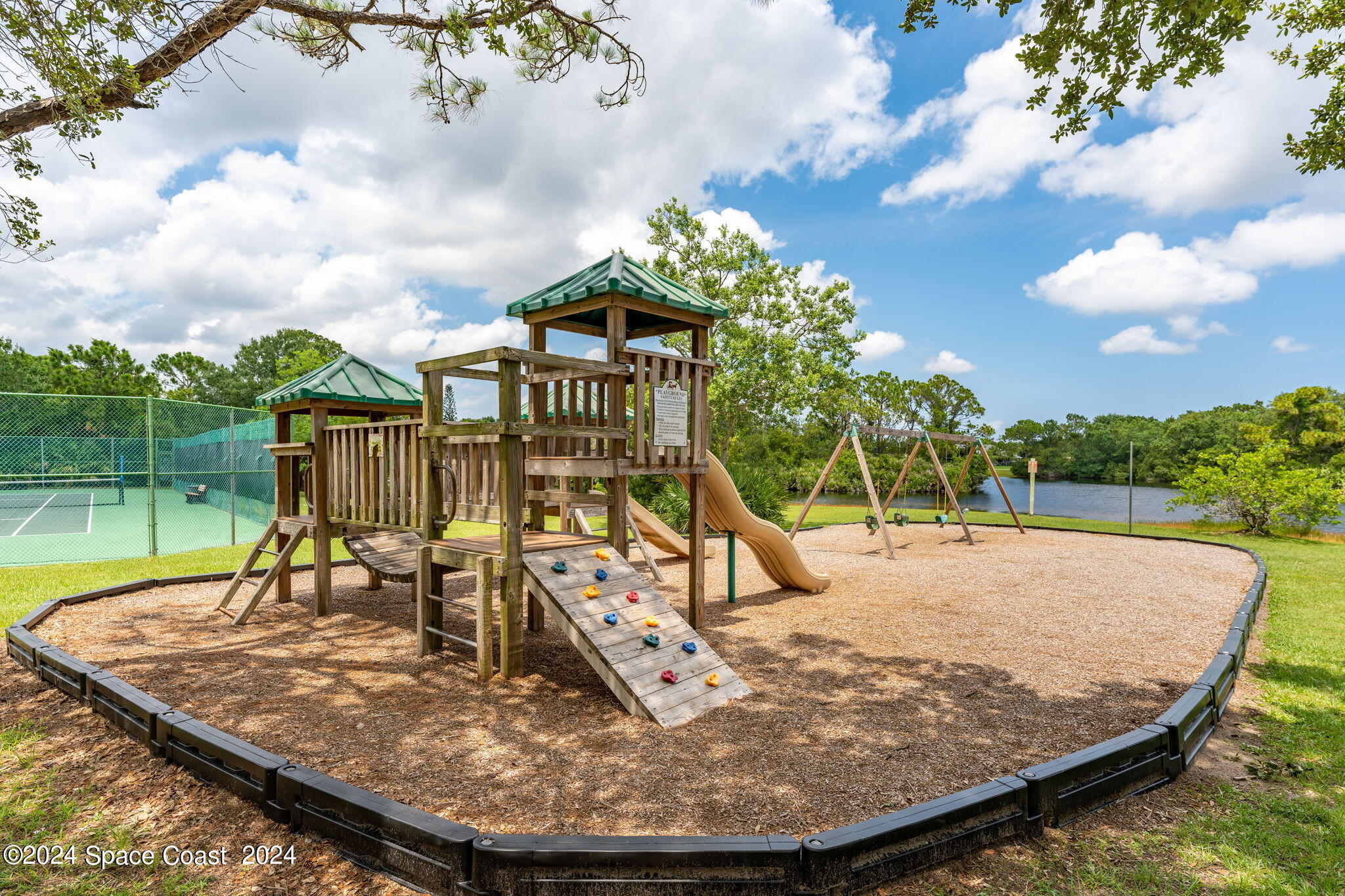 4140 Windover Way Melbourne, FL 32934 - Photo 48 of 53 a view of a swimming pool with a sitting space