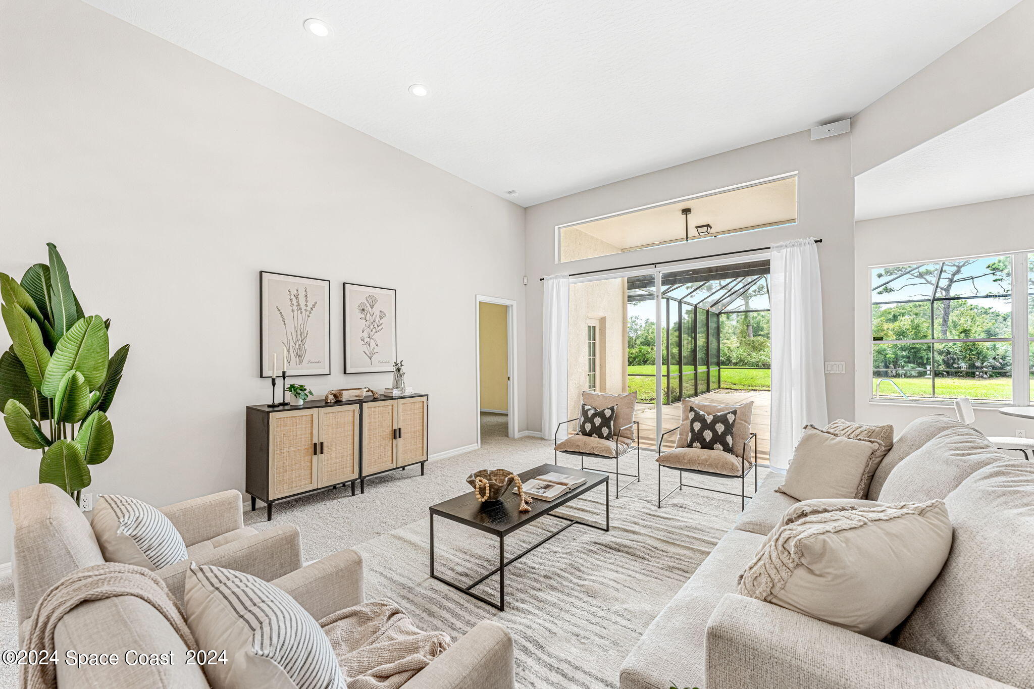 4140 Windover Way Melbourne, FL 32934 - Photo 10 of 53 a living room with furniture and a large window